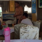 No shirt in restaurant